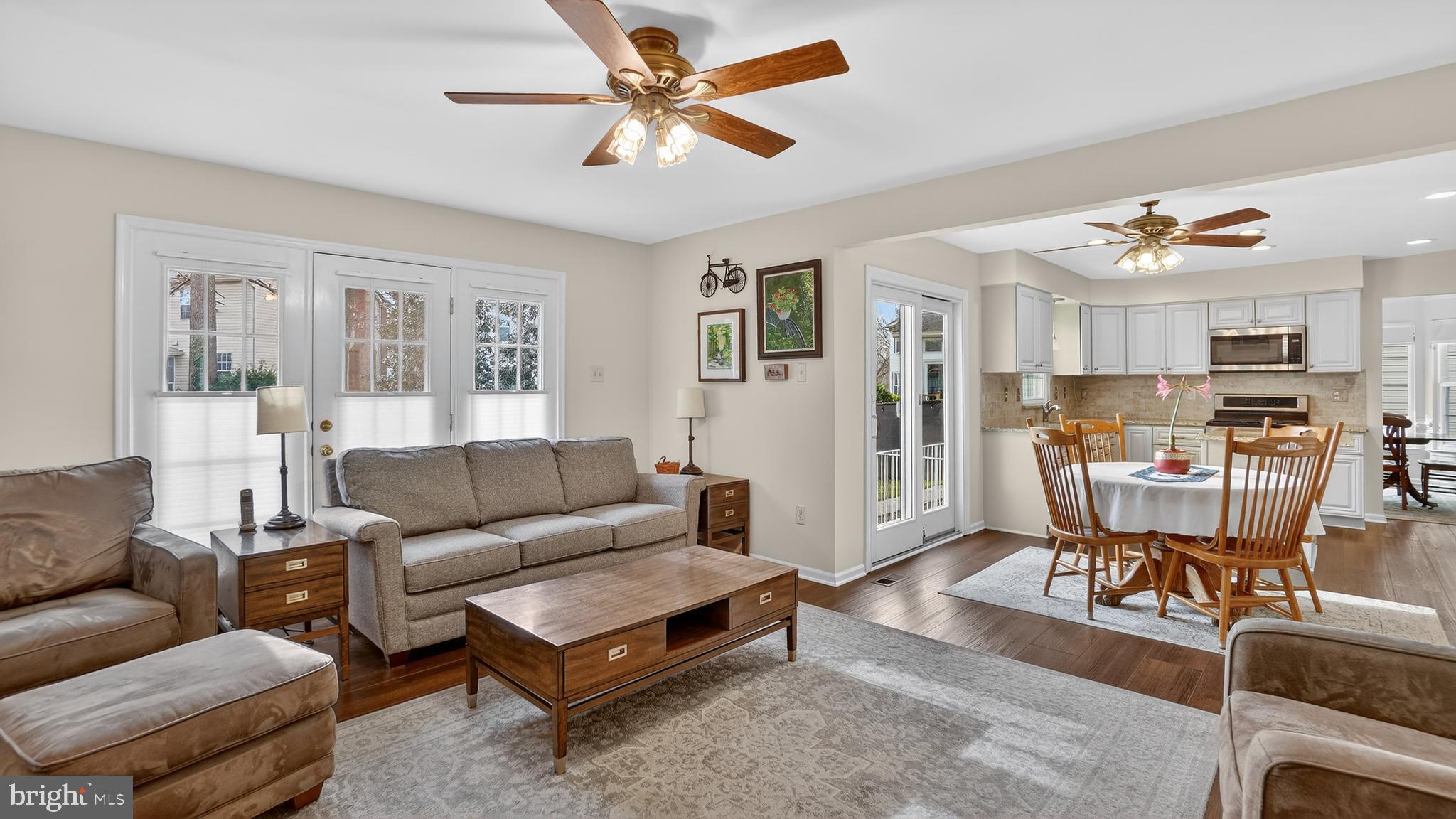 2709 Bains Court Crofton, MD 21114 - Photo 20 of 63 a living room with furniture kitchen view and a window