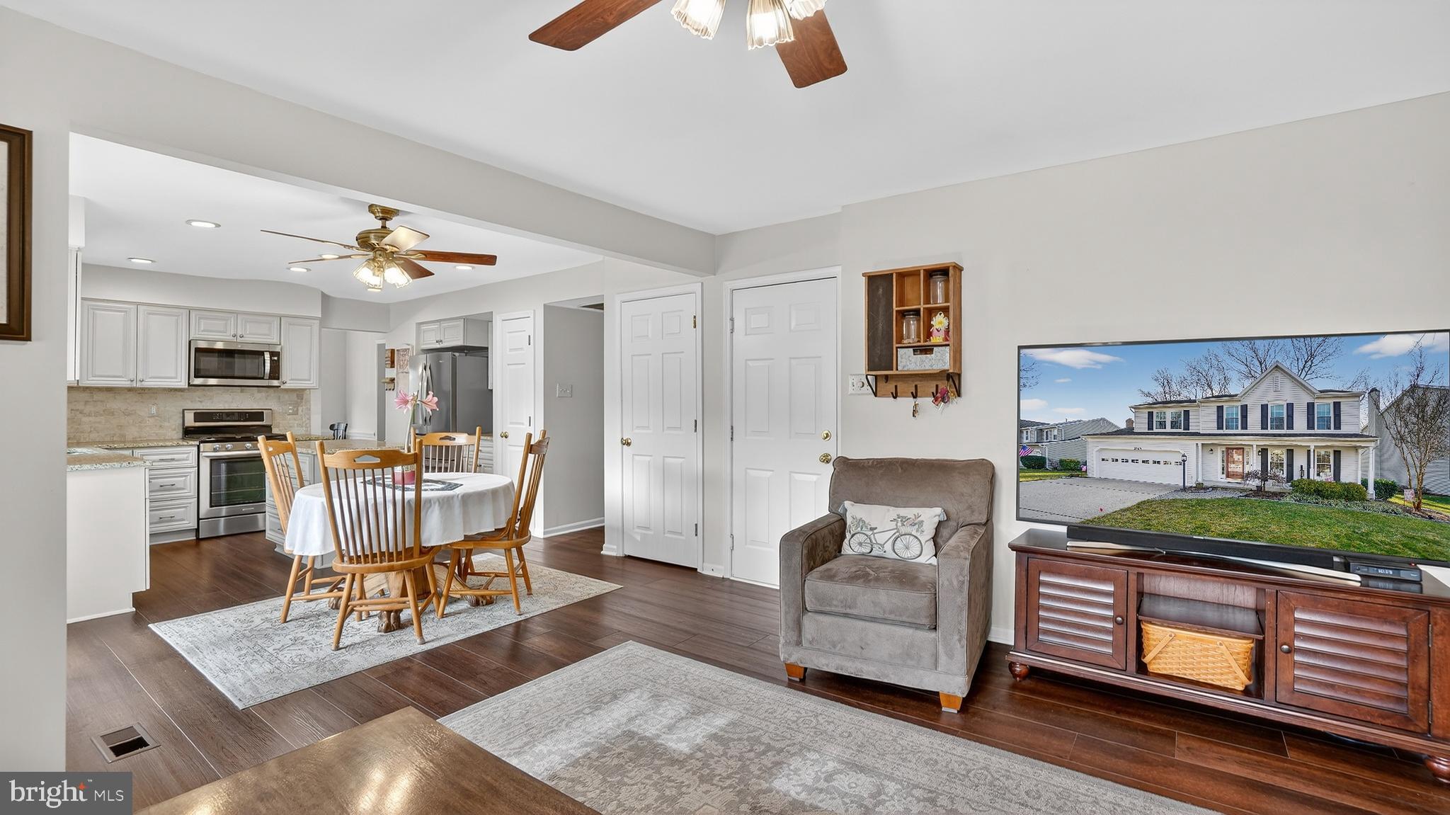 2709 Bains Court Crofton, MD 21114 - Photo 21 of 63 a living room with furniture and a kitchen