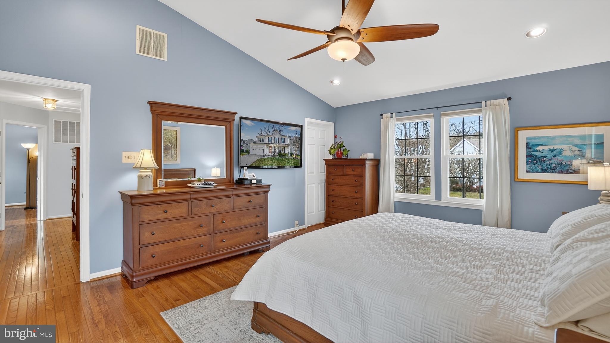 2709 Bains Court Crofton, MD 21114 - Photo 26 of 63 a bedroom with a bed and a dresser