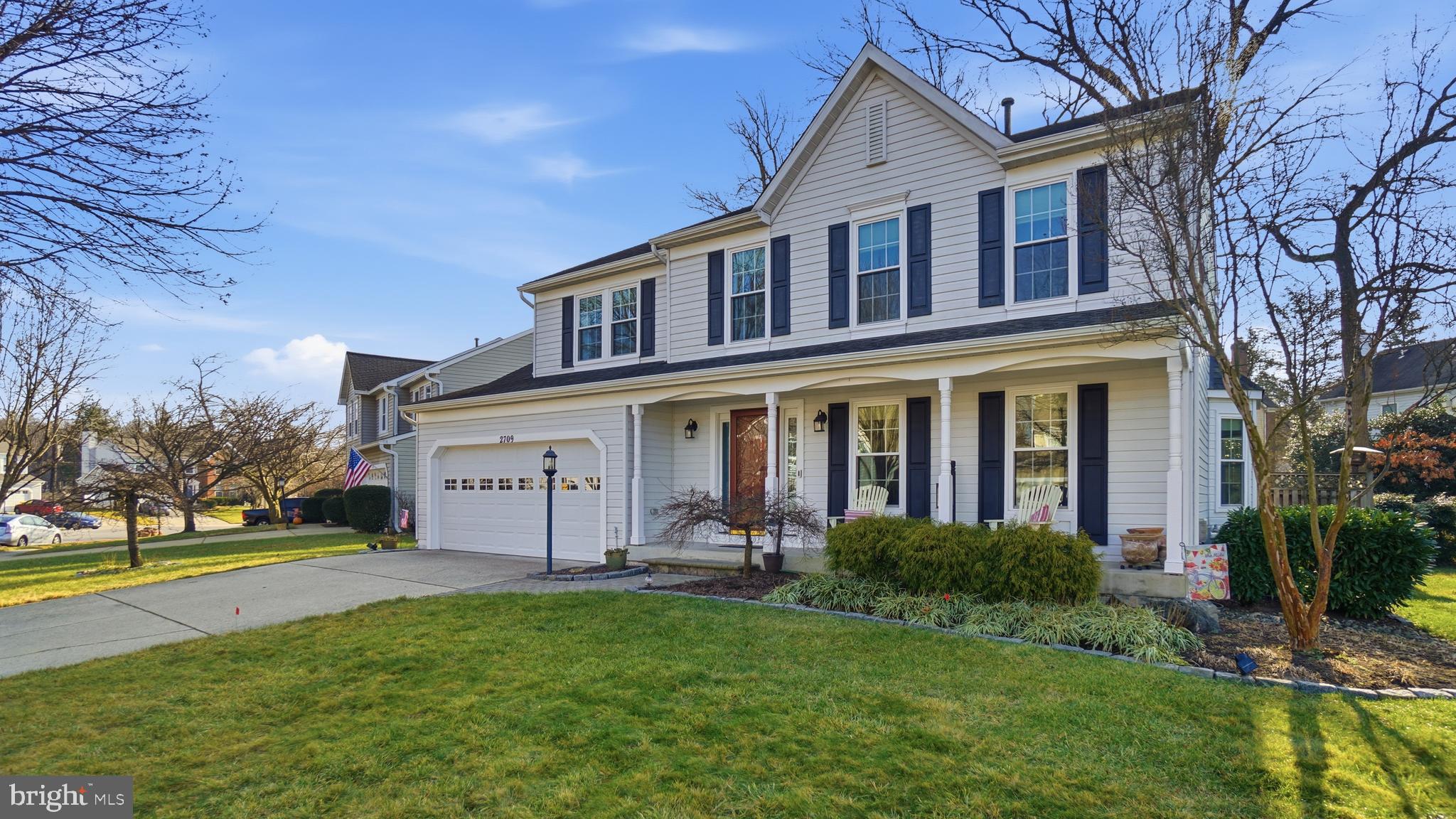2709 Bains Court Crofton, MD 21114 - Photo 3 of 63 a front view of a house with garden