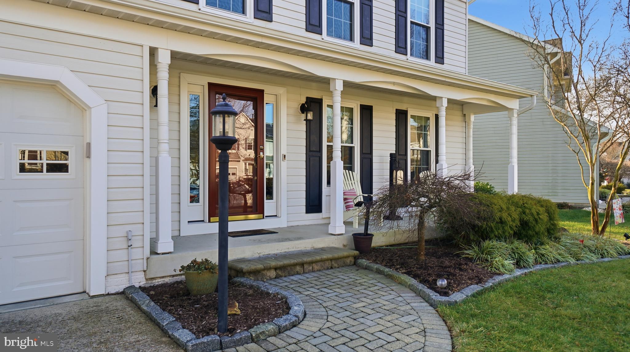 2709 Bains Court Crofton, MD 21114 - Photo 4 of 63 a front view of a house with garden