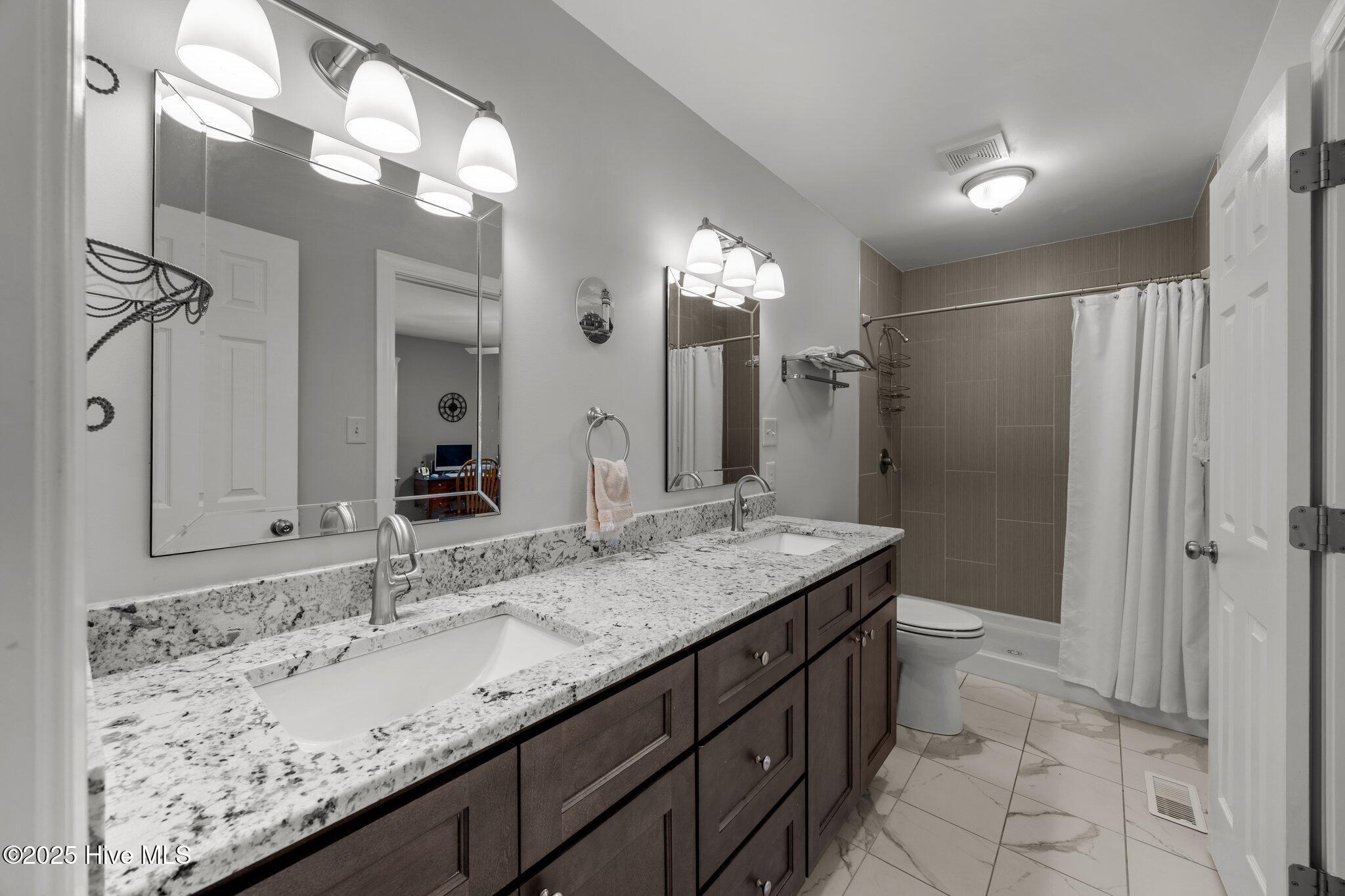 204 Gangplank Road New Bern, NC 28562 - Photo 17 of 47 Renovated Primary Bath Downstairs