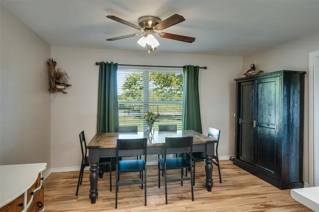 a kitchen that has a sink and cabinets in it