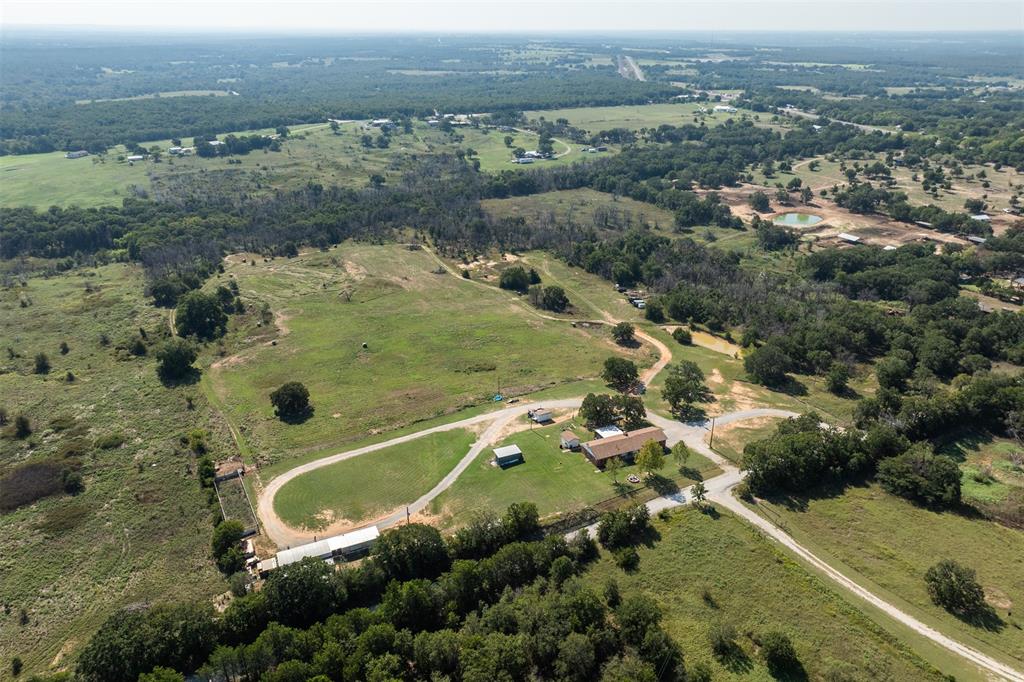 917 Cole Lane Sunset, TX 76270 - Photo 33 of 40 an aerial view of a residential houses with outdoor space