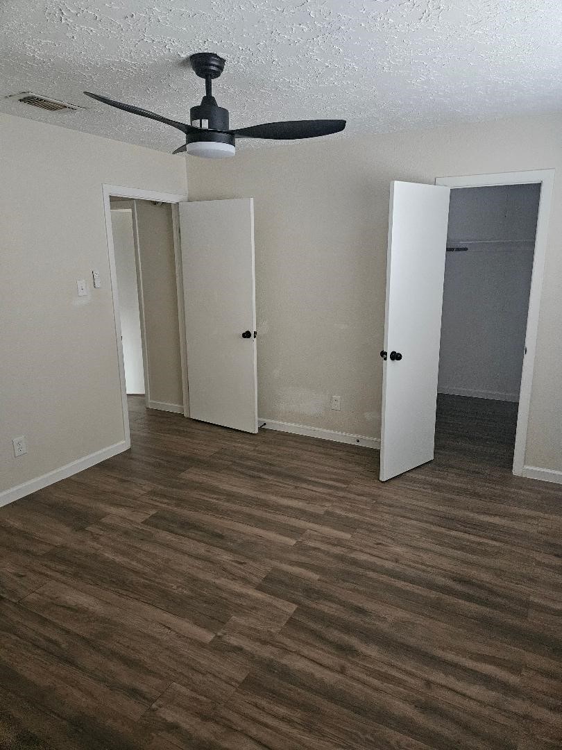 711 Leicester Lane Houston, TX 77034 - Photo 16 of 16 a view of a livingroom with wooden floor