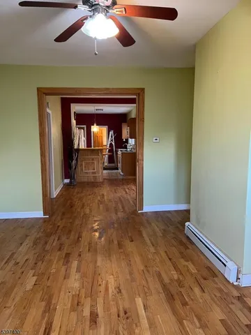 a kitchen with stainless steel appliances granite countertop a sink and a stove top oven