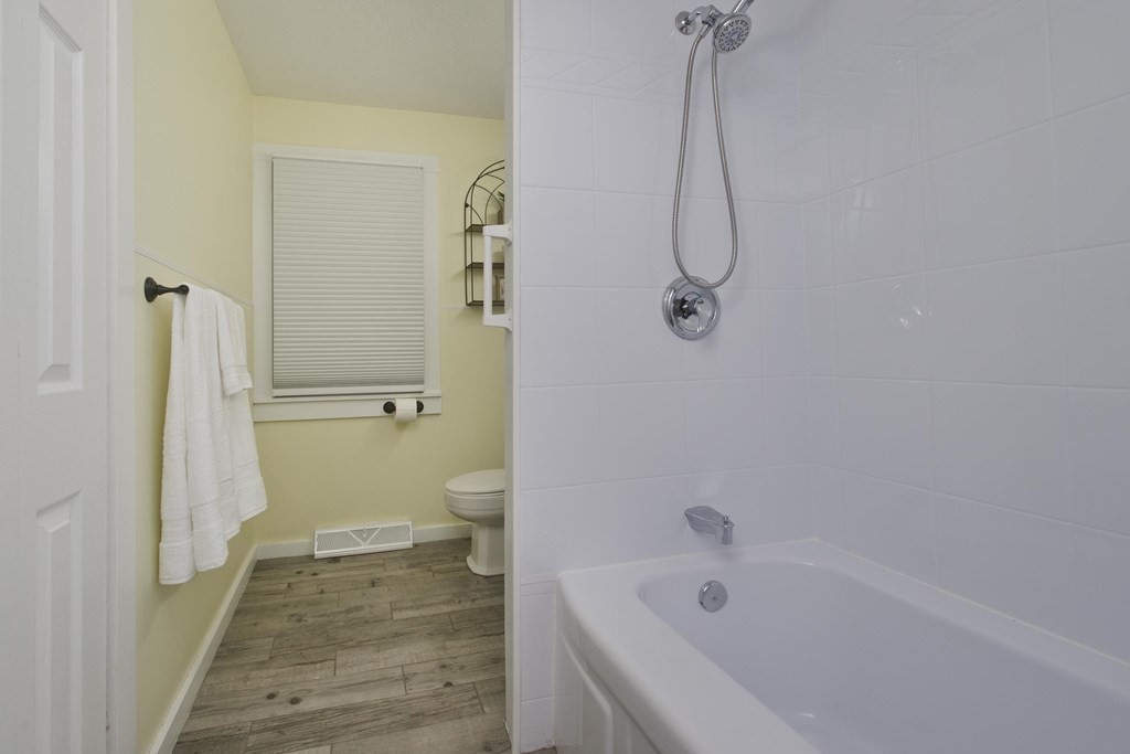 1041 Burts Pit Road Northampton, MA 01062 - Photo 12 of 22 a bathroom with a sink a toilet and shower