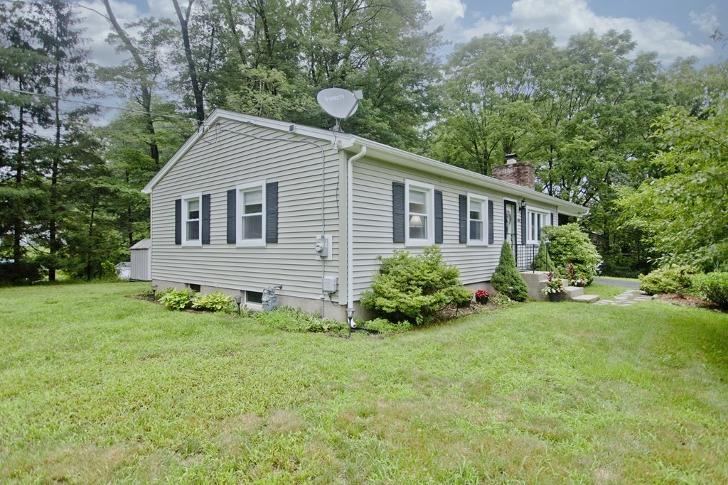 1041 Burts Pit Road Northampton, MA 01062 - Photo 19 of 22 a view of a house with backyard and garden