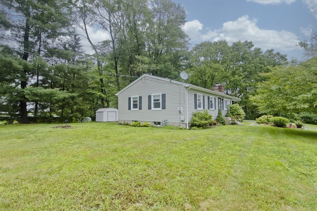 1041 Burts Pit Road Northampton, MA 01062 - Photo 20 of 22 a house with a tree in front of it