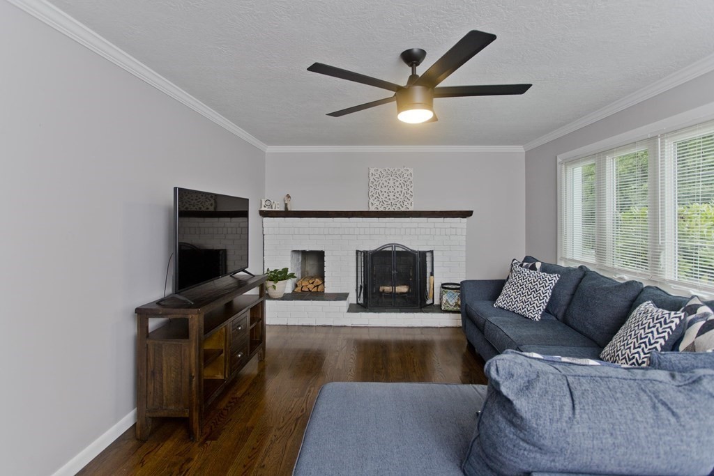 1041 Burts Pit Road Northampton, MA 01062 - Photo 8 of 22 a living room with furniture and a fireplace