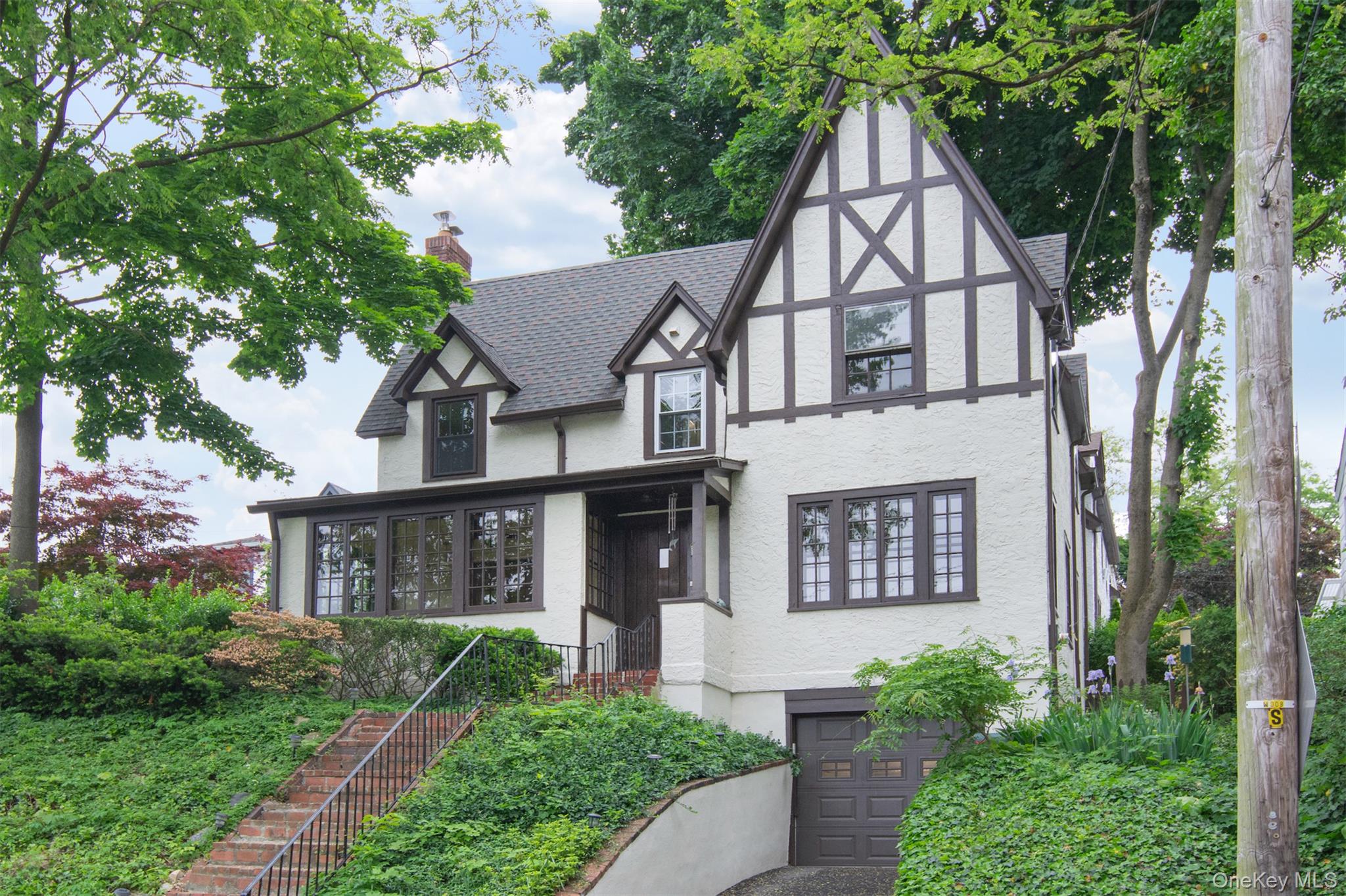 370 Scarsdale Road Tuckahoe, NY 10707 - Photo 2 of 25 Tudor-style residence featuring white stucco and dark timber framing