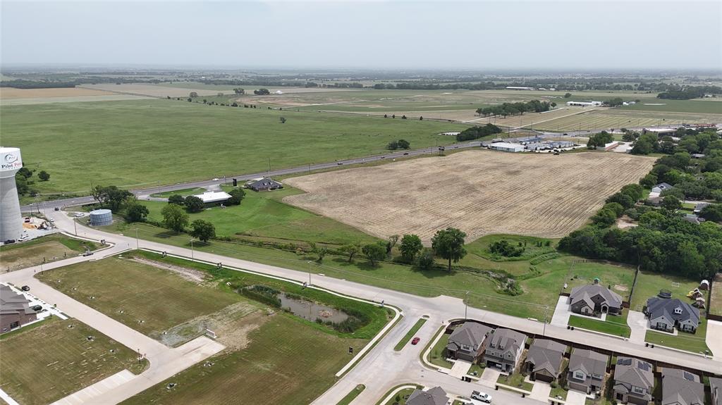 377 Pilot Point Pilot Point, TX 76258 - Photo 5 of 10 Aerial overview of property's location landscape and a pastoral area