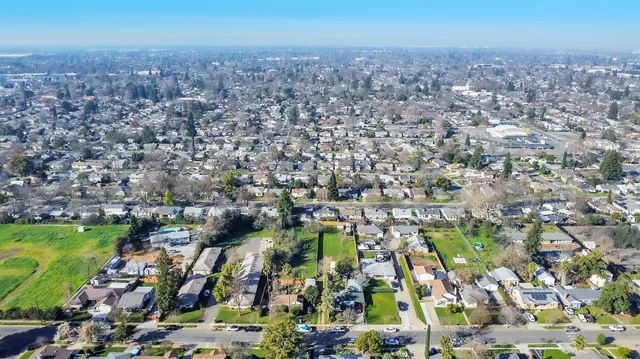 an aerial view of a city with lots of residential buildings