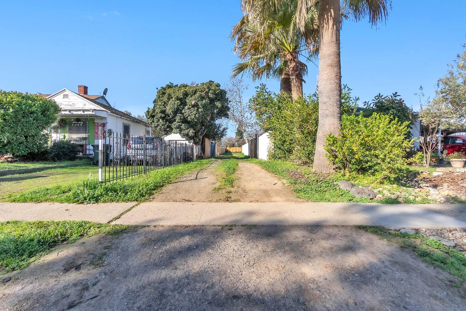 4194 63rd Street Sacramento, CA 95820 - Photo 2 of 41 a view of a yard with plants and trees