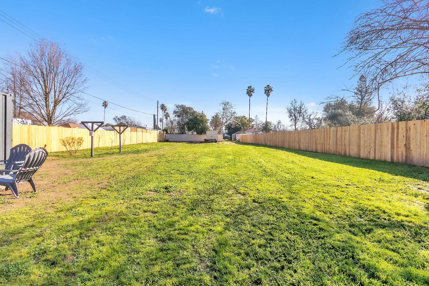 4194 63rd Street Sacramento, CA 95820 - Photo 9 of 41 a view of a swimming pool with a patio and a yard