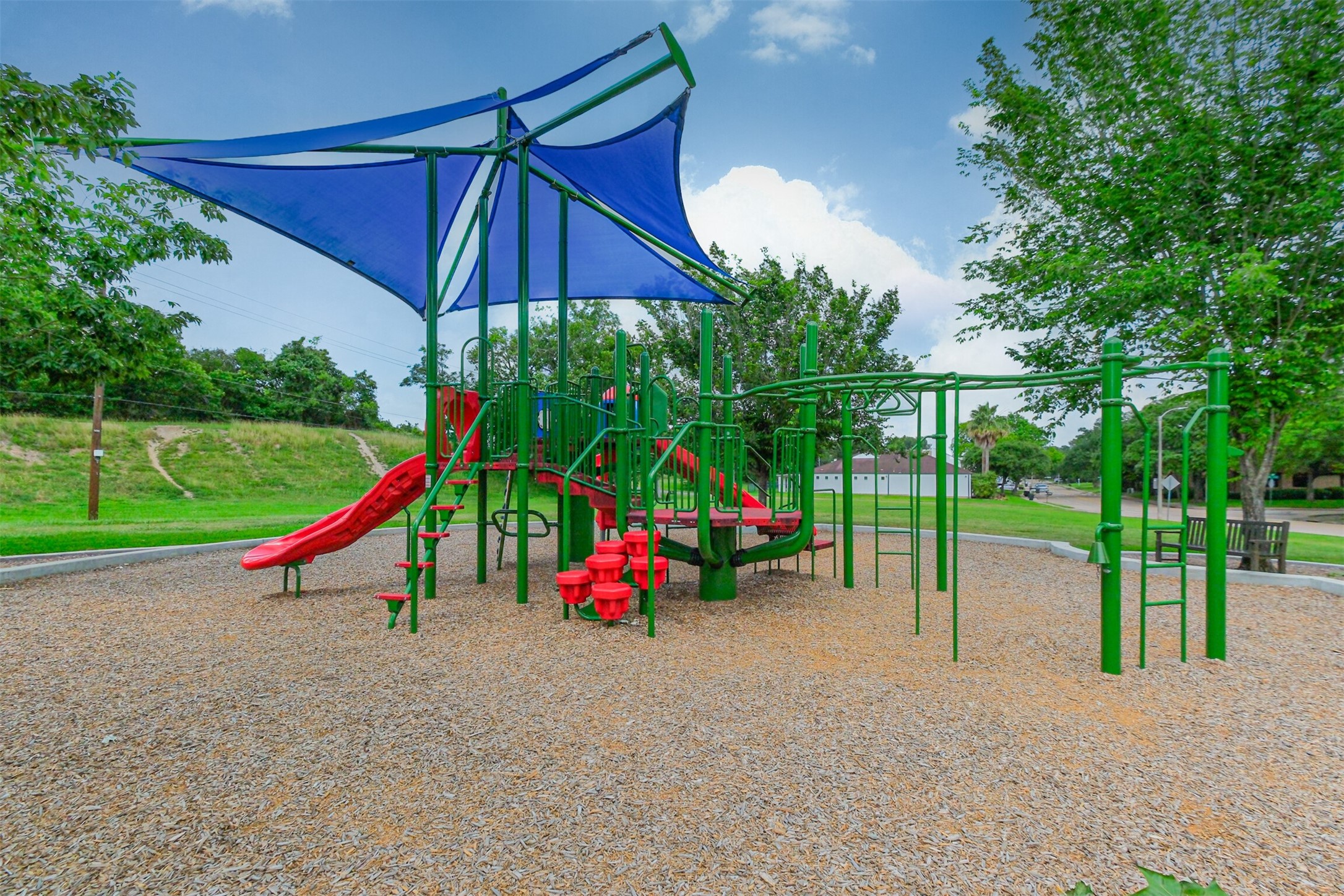 1007 Arrow Hill Road Houston, TX 77077 - Photo 45 of 50 a view of park with slide and entertaining space
