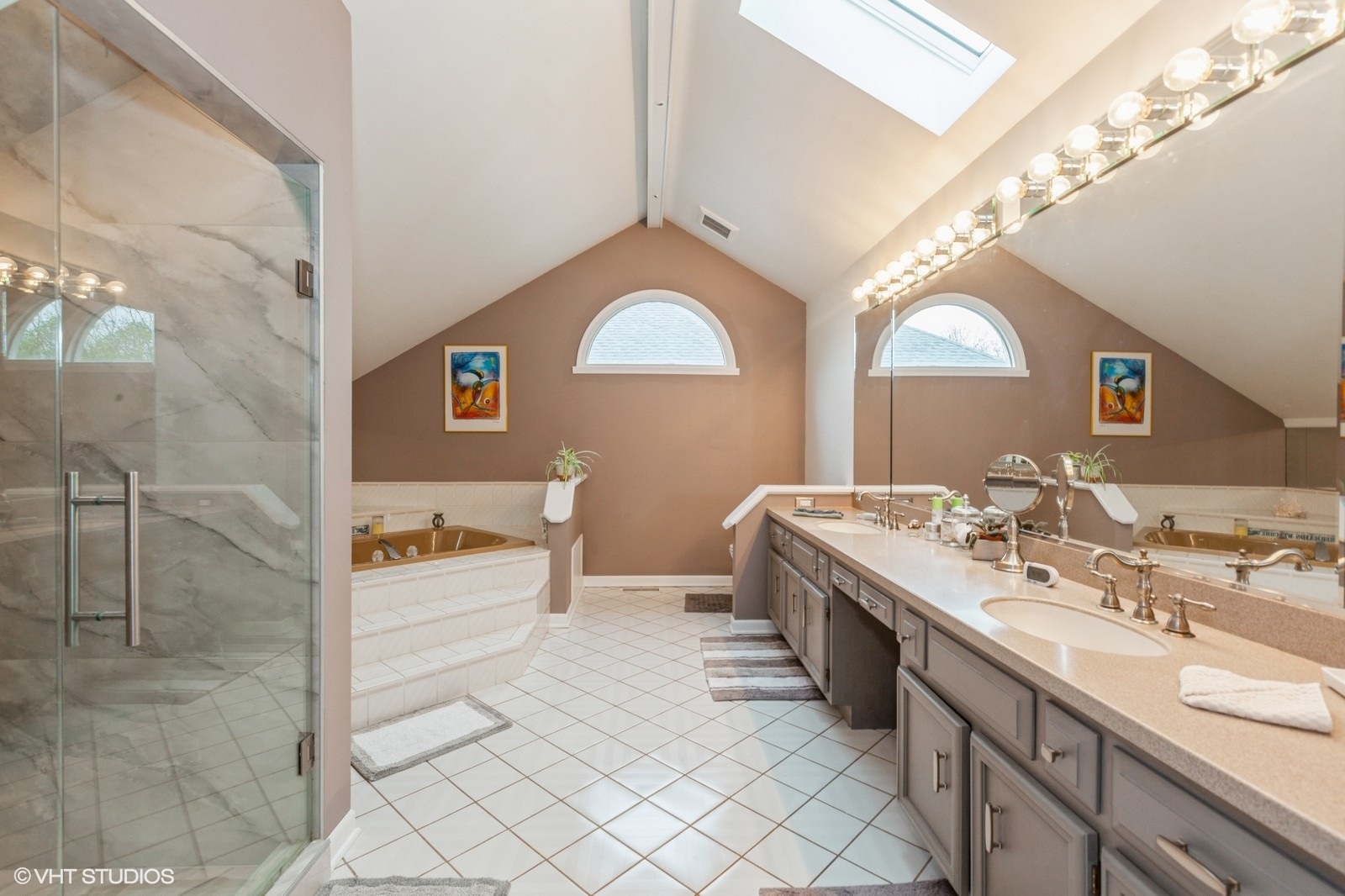 446 Quail Drive Naperville, IL 60565 - Photo 13 of 24 a spacious bathroom with a double vanity sink a mirror and a shower