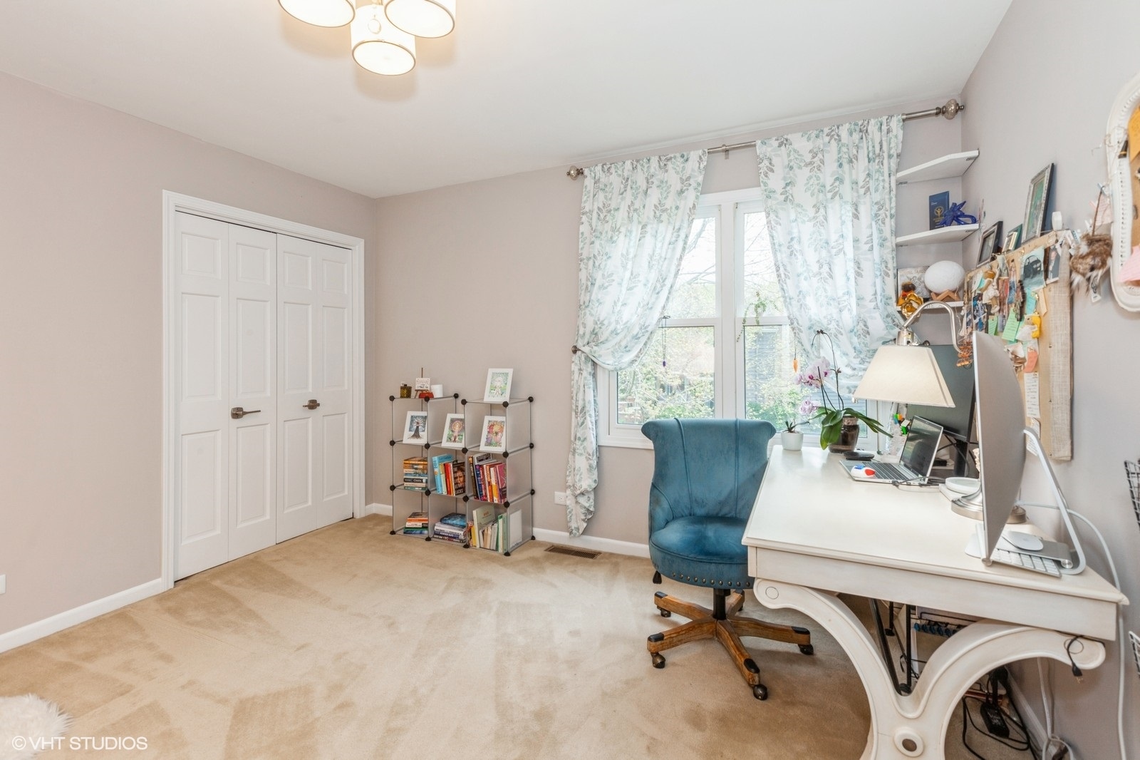 446 Quail Drive Naperville, IL 60565 - Photo 14 of 24 a view of a workspace with furniture and a window