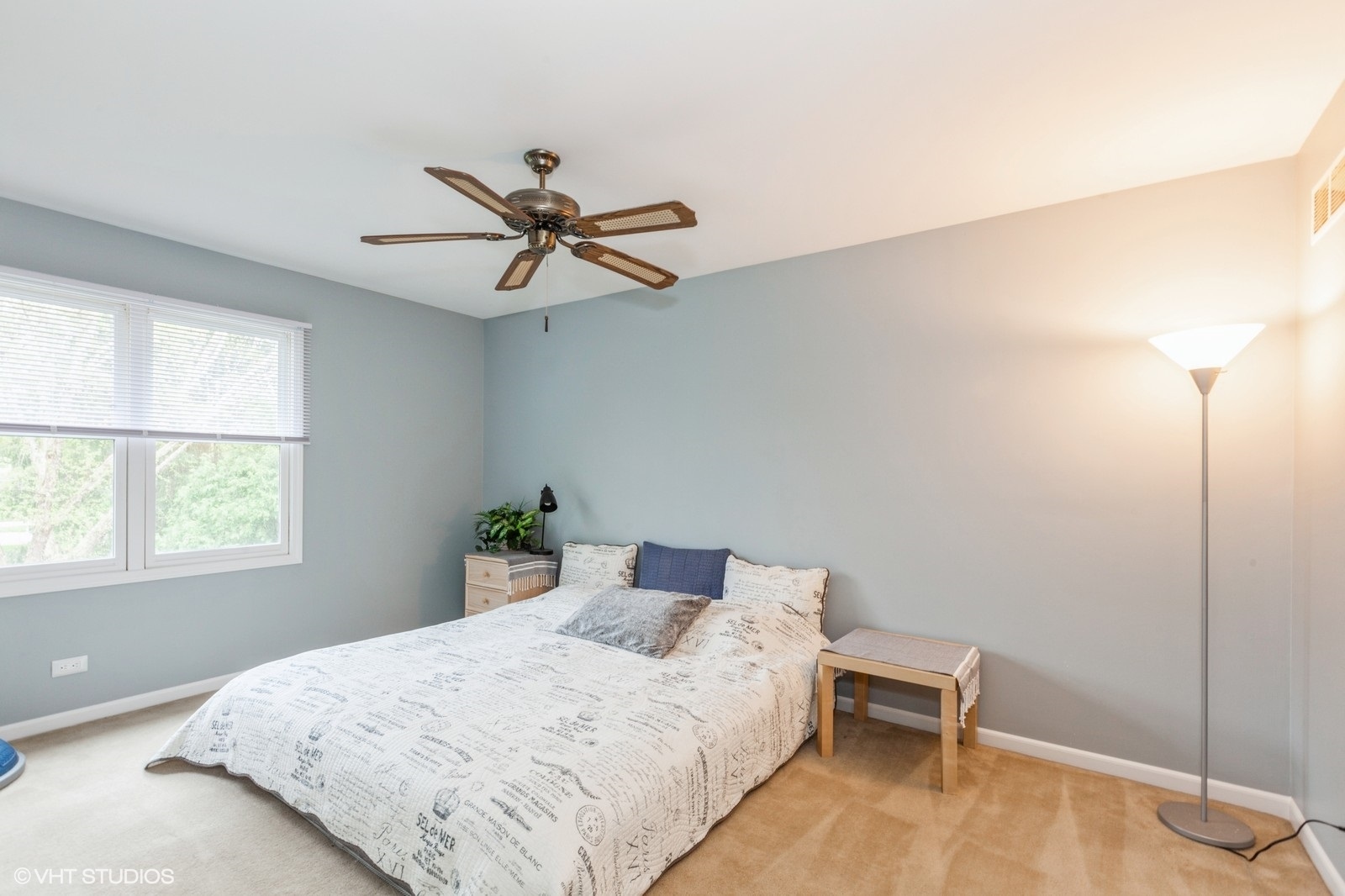 446 Quail Drive Naperville, IL 60565 - Photo 15 of 24 a bedroom with a bed and a window