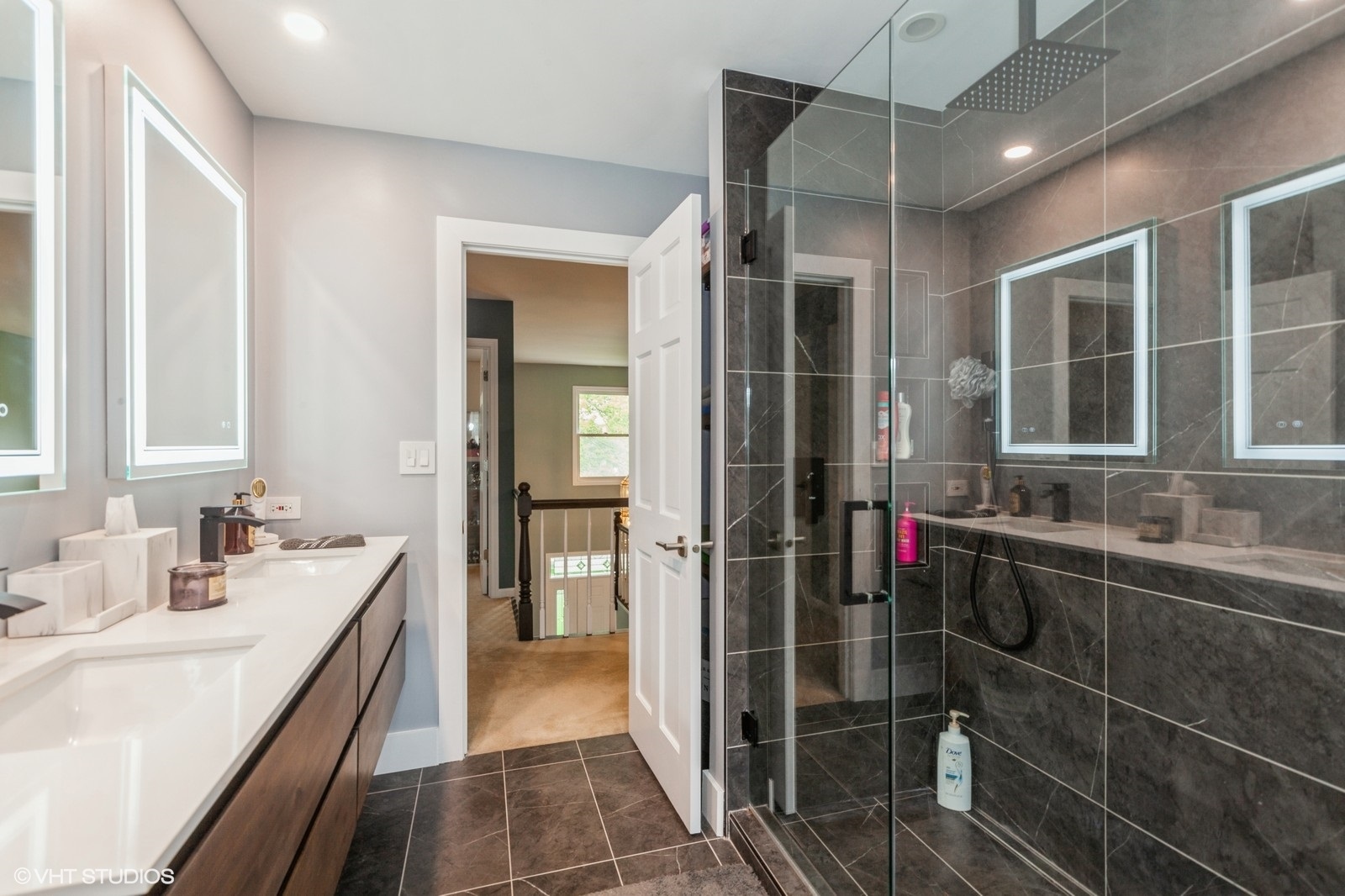 446 Quail Drive Naperville, IL 60565 - Photo 18 of 24 a bathroom with a double vanity sink a toilet and shower