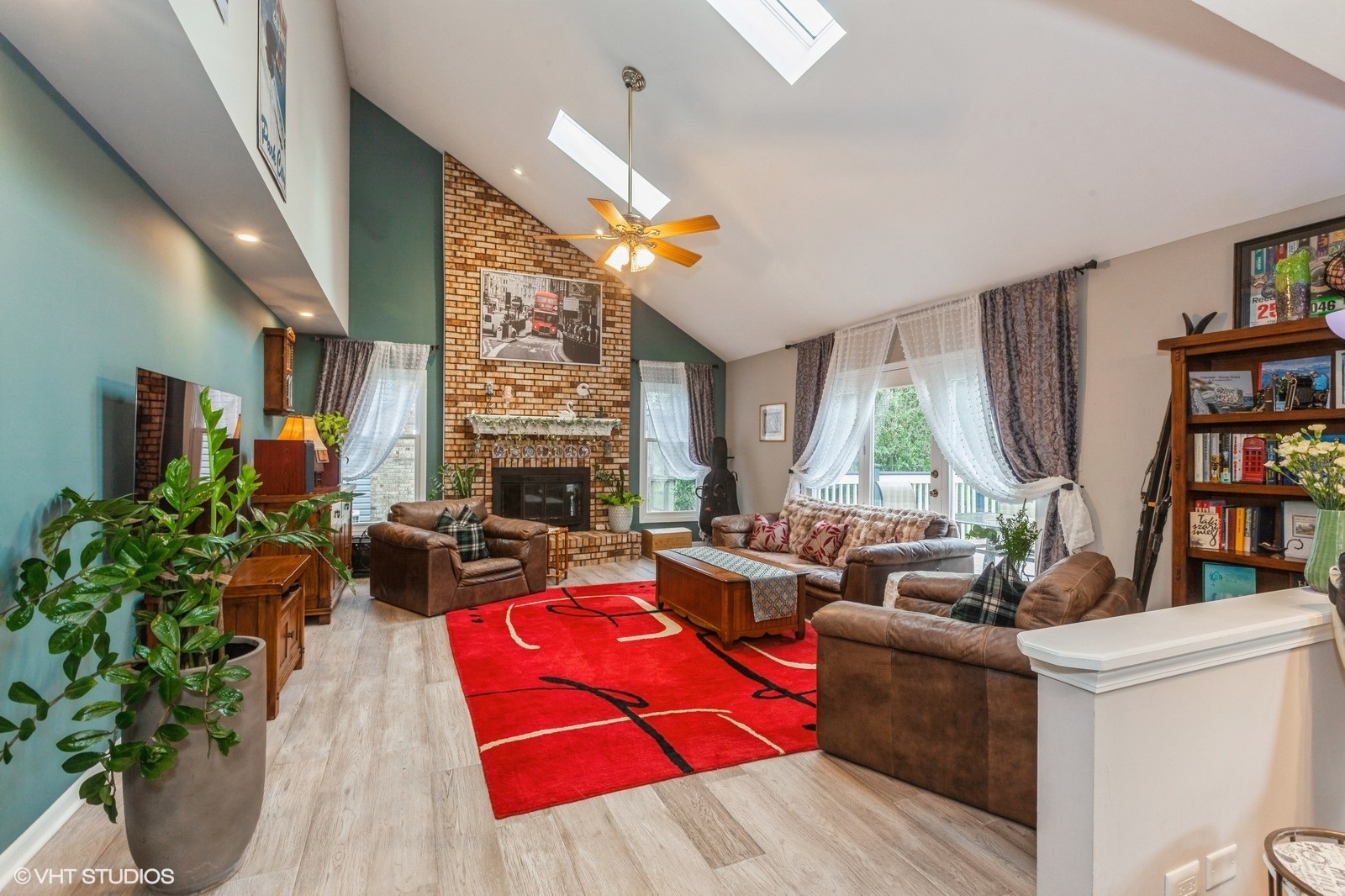 446 Quail Drive Naperville, IL 60565 - Photo 8 of 24 a living room with fireplace furniture and a potted plant