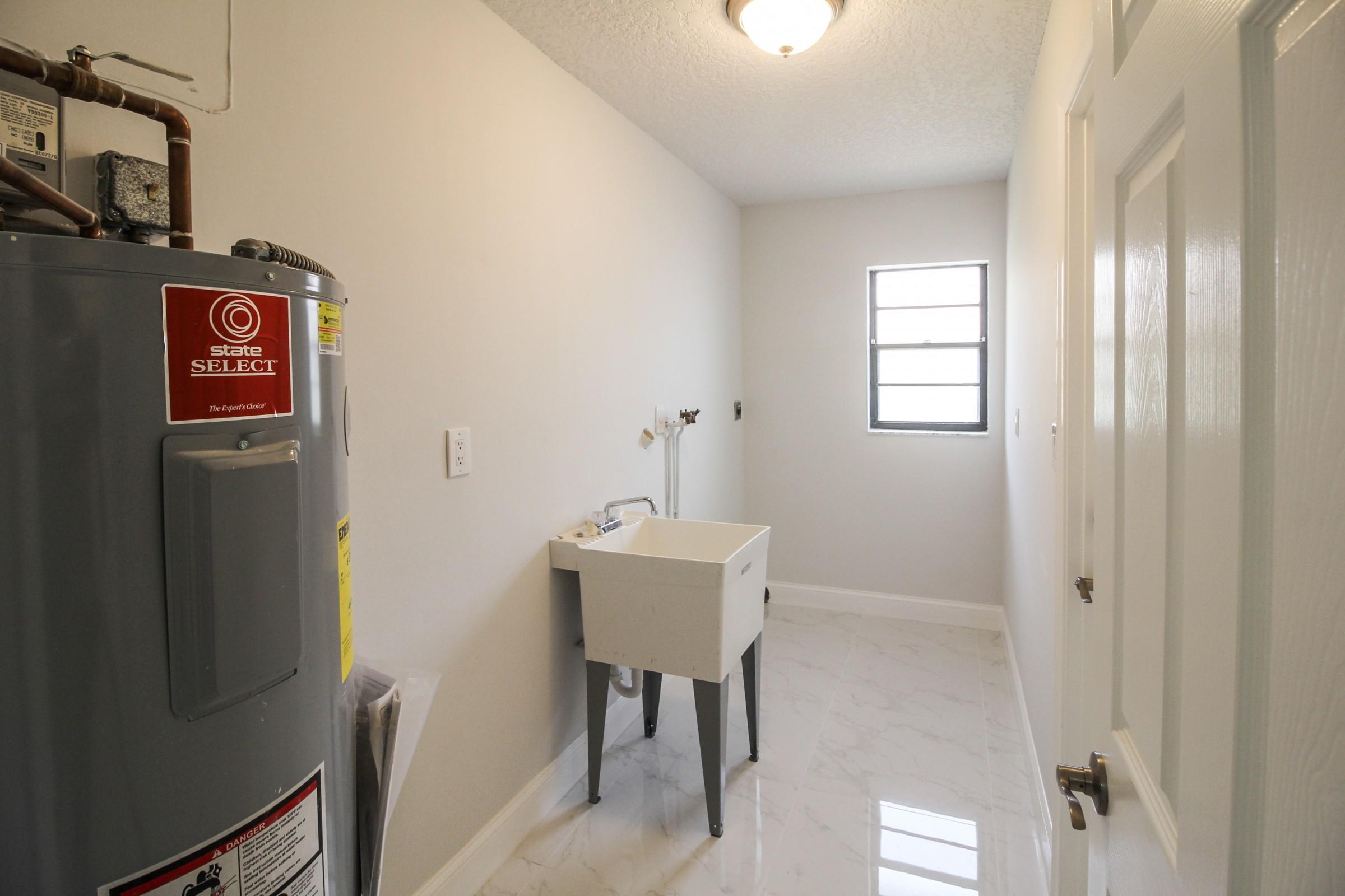 4920 Northwest 3rd Terrace Boca Raton, FL 33431 - Photo 29 of 29 Laundry Room
