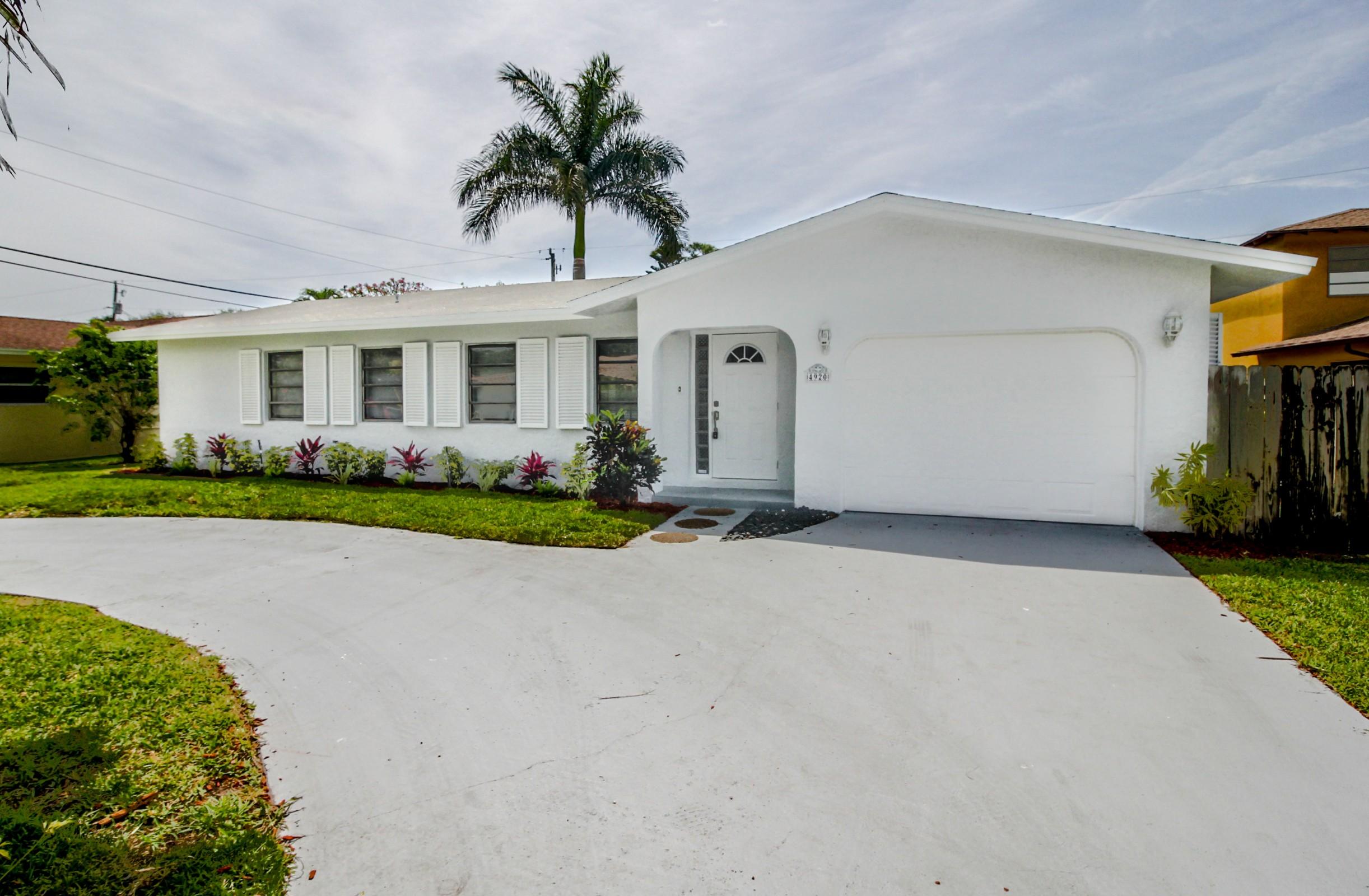 4920 Northwest 3rd Terrace Boca Raton, FL 33431 - Photo 3 of 29 Front 3