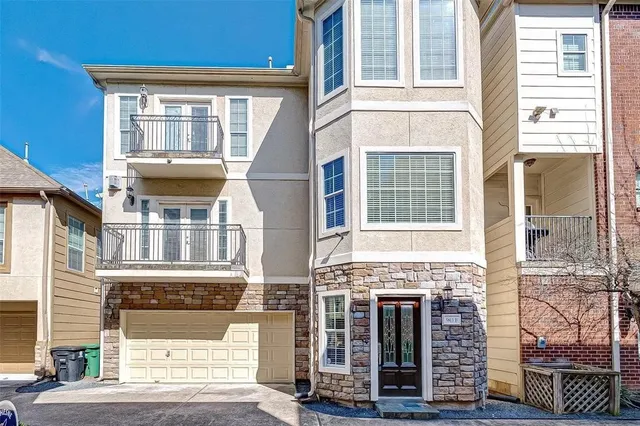 a front view of a multi story residential apartment building