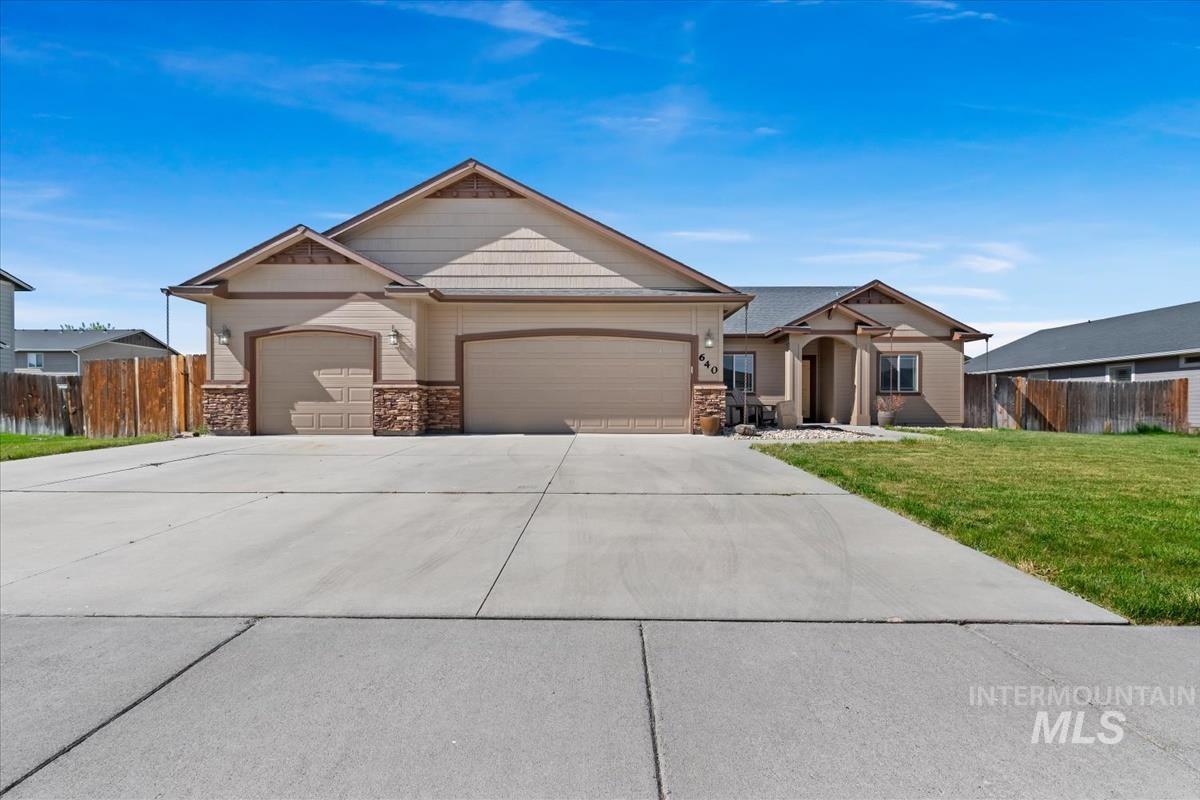 640 Southwest Miner Street Mountain Home, ID 83647 - Photo 1 of 35 Ranch-style residence featuring a stucco and stone veneer exterior
