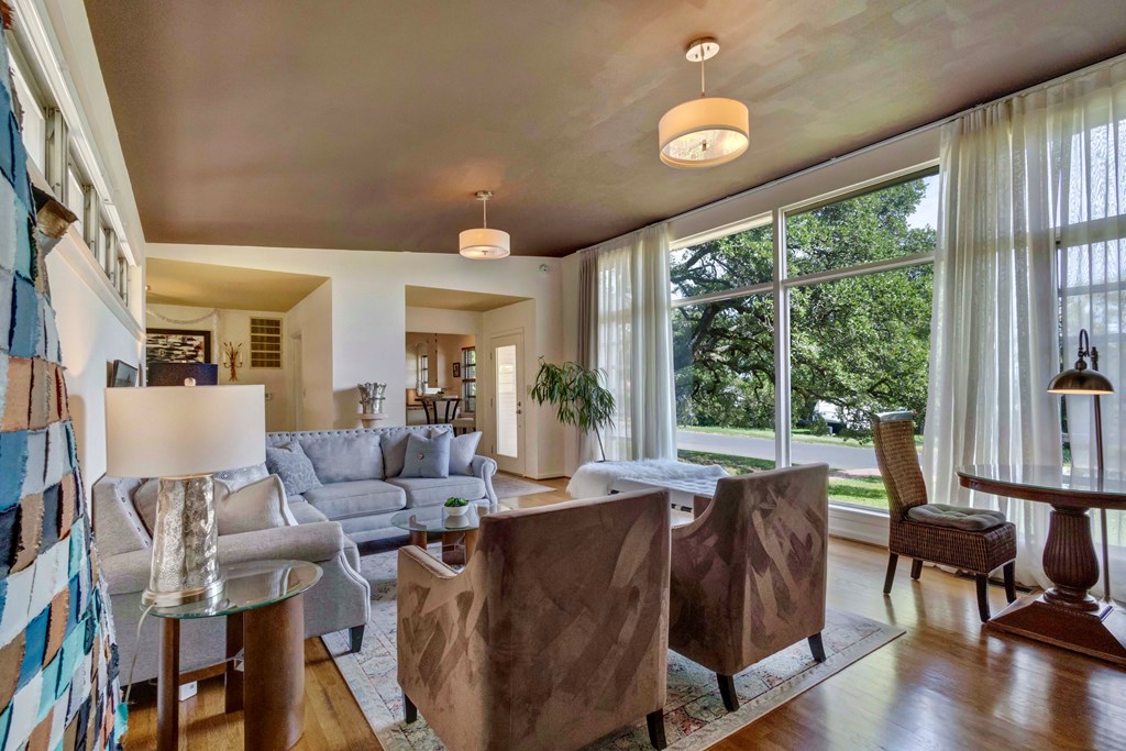 207 East Walnut Street Fredericksburg, TX 78624 - Photo 8 of 42 a living room with furniture and a large window