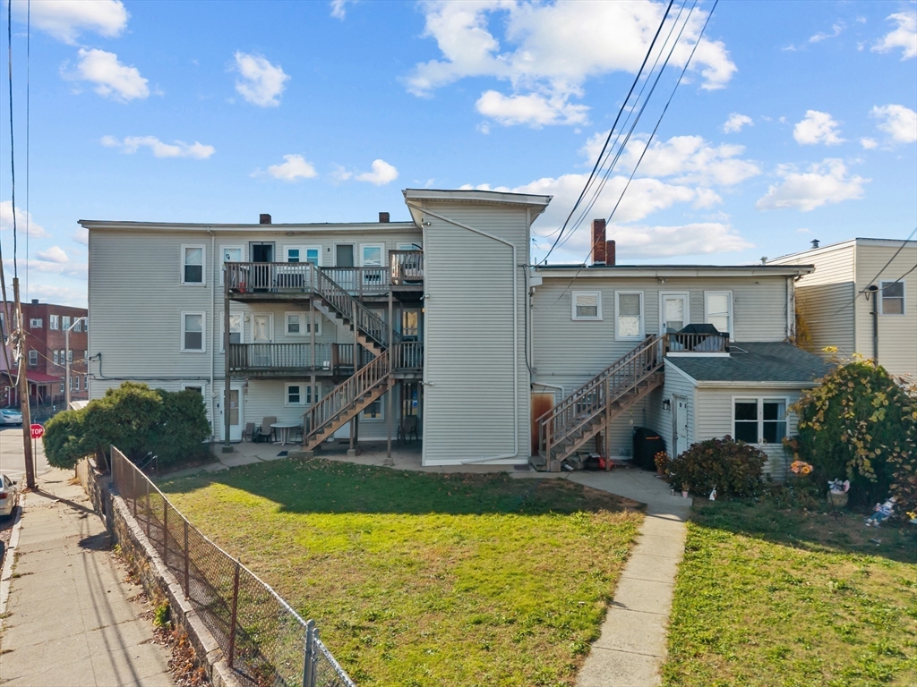 1498-1508 Pleasant Street Fall River, MA 02723 - Photo 5 of 8 a view of a house with swimming pool