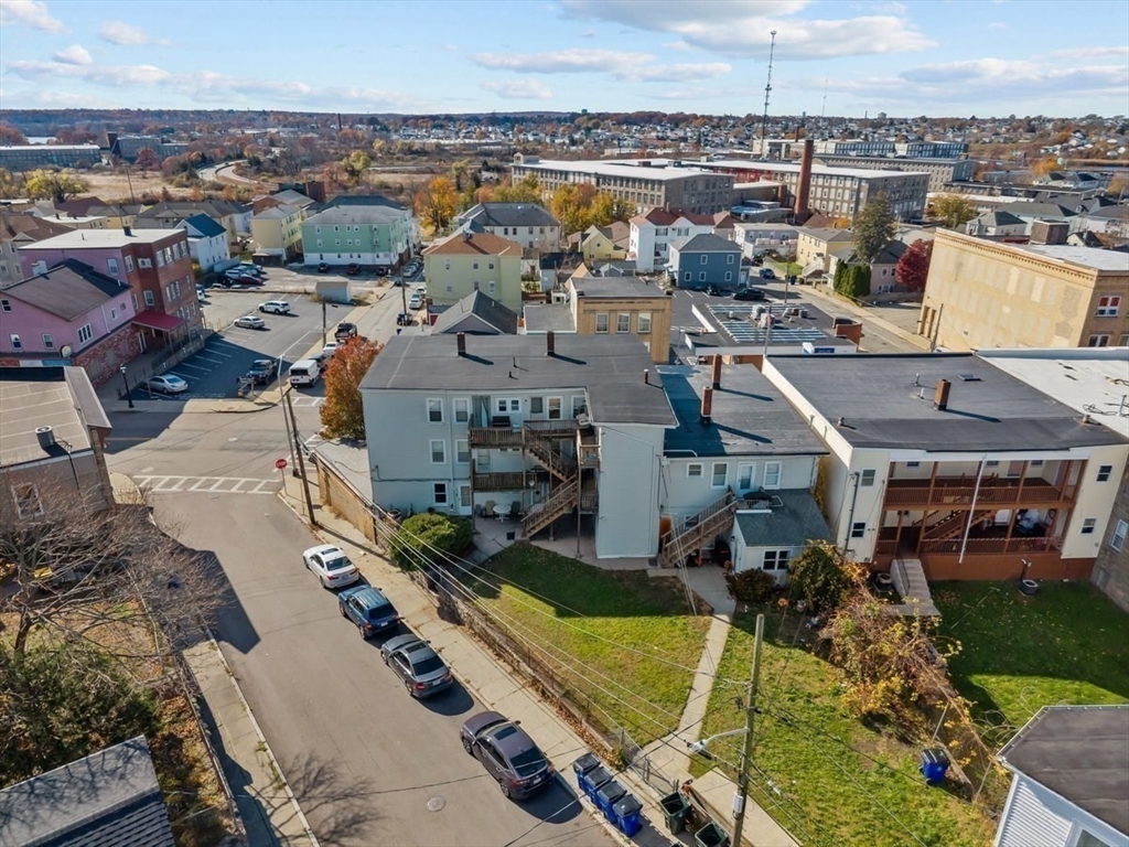 1498-1508 Pleasant Street Fall River, MA 02723 - Photo 7 of 8 an aerial view of a residential building with outdoor space