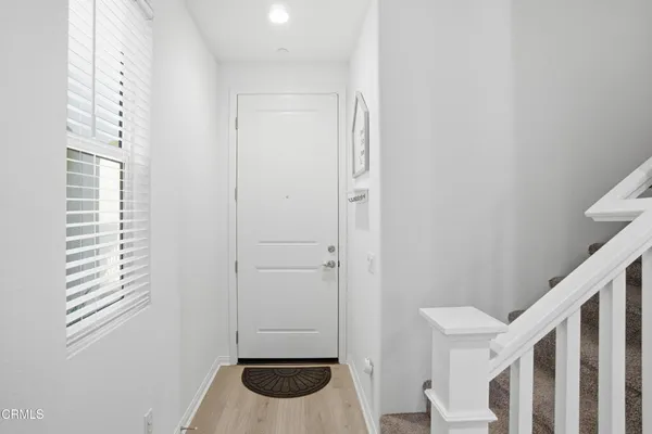 a bathroom with a sink and a window