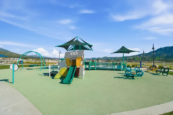 swimming pool with table and chairs