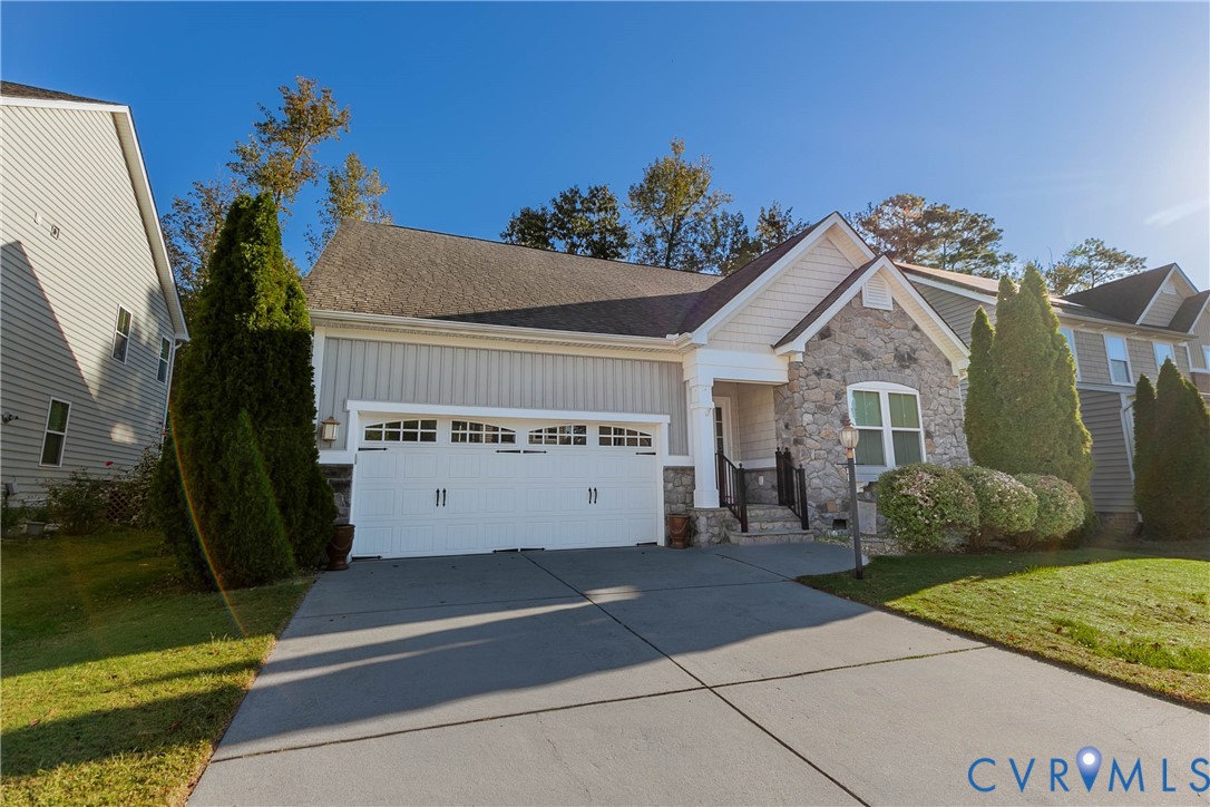 7533 South Franklins Way Quinton, VA 23141 - Photo 2 of 46 a view of a house with a garden