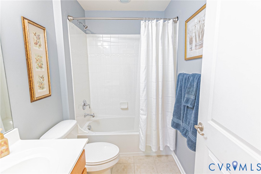 7533 South Franklins Way Quinton, VA 23141 - Photo 21 of 46 a bathroom with a toilet a sink and a bathtub