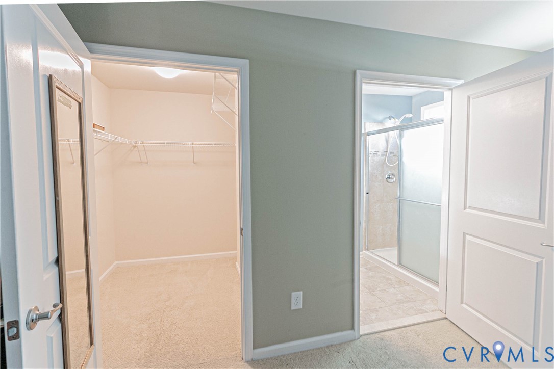 7533 South Franklins Way Quinton, VA 23141 - Photo 29 of 46 a bathroom with a glass shower door