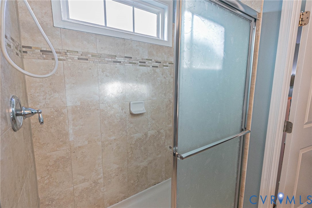 7533 South Franklins Way Quinton, VA 23141 - Photo 31 of 46 a bathroom with a shower