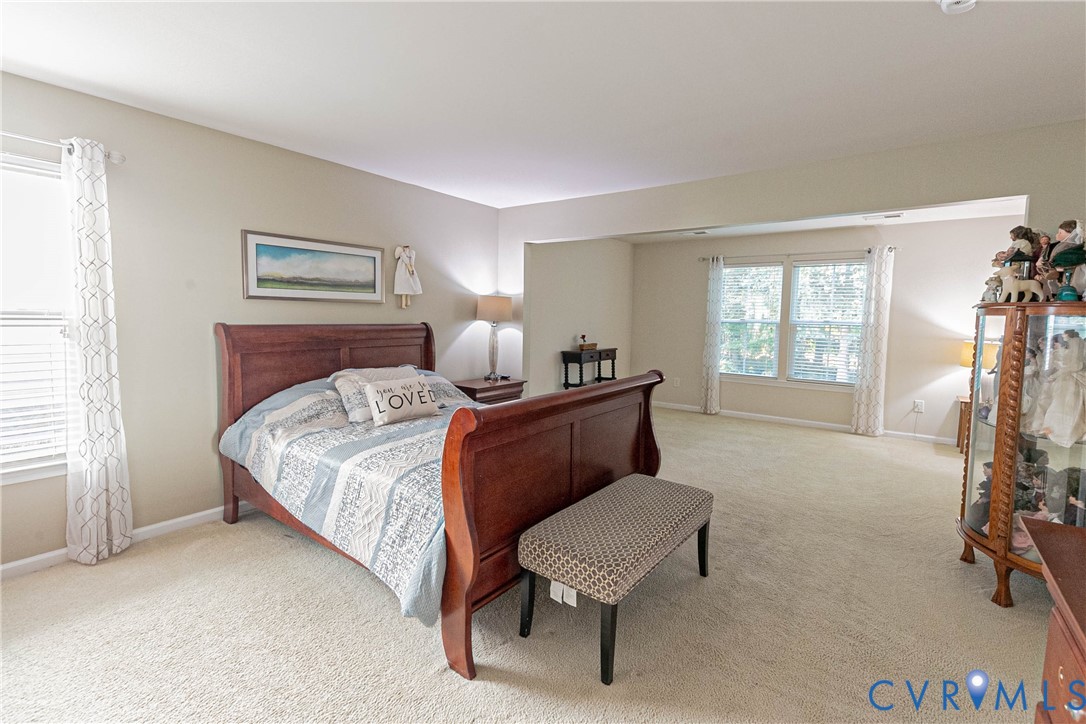 7533 South Franklins Way Quinton, VA 23141 - Photo 34 of 46 a bedroom with a bed and a window