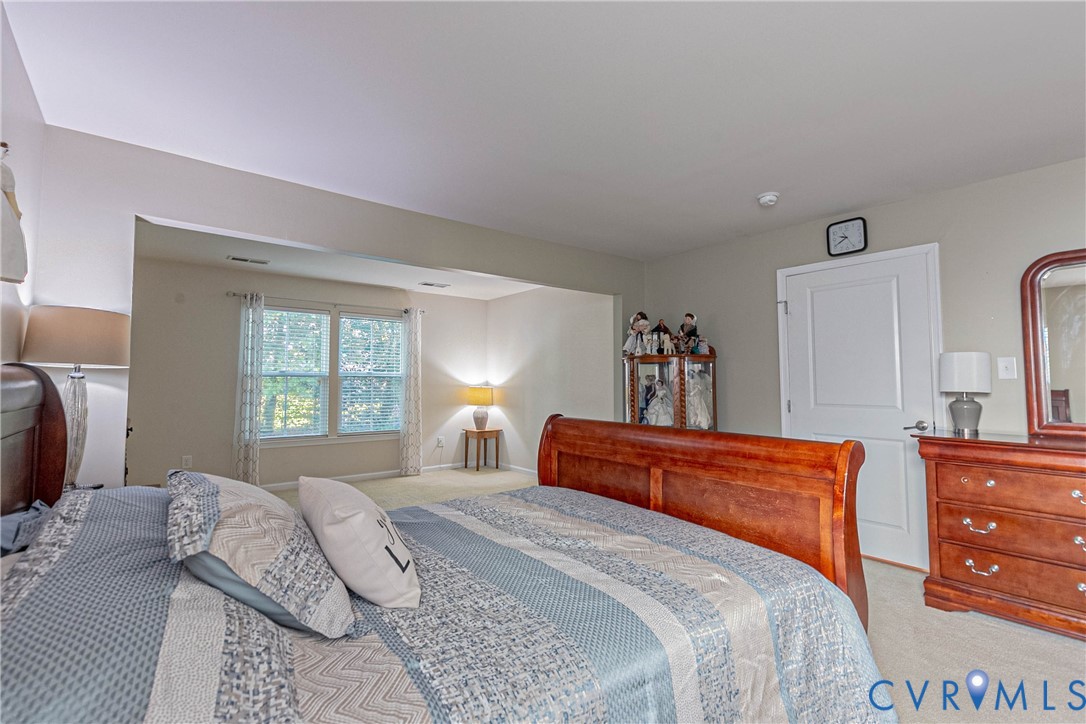 7533 South Franklins Way Quinton, VA 23141 - Photo 35 of 46 a bedroom with a bed and window