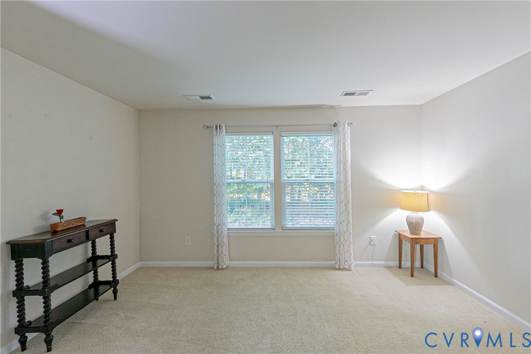 7533 South Franklins Way Quinton, VA 23141 - Photo 39 of 46 a view of room with window and workspace