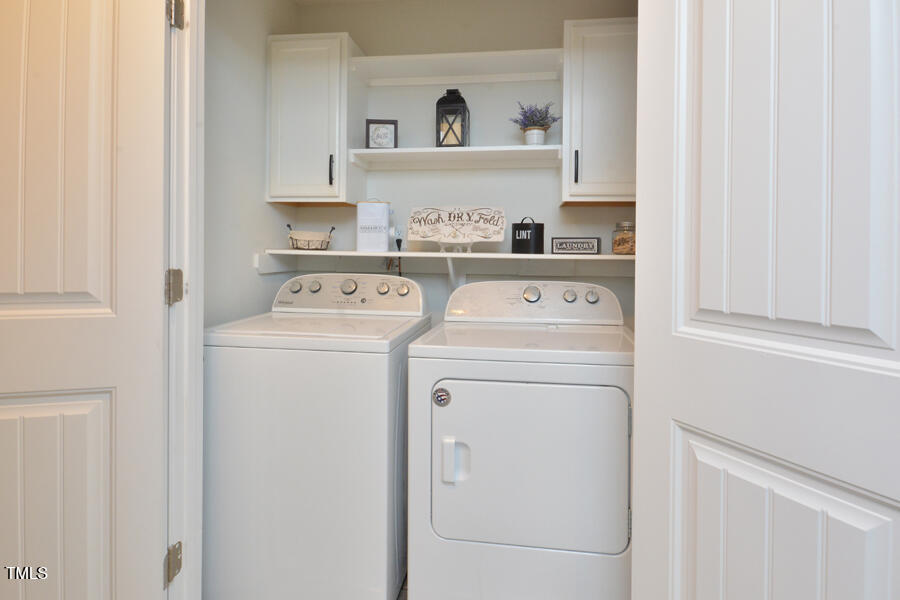 195 Timberwind Road Franklinton, NC 27525 - Photo 19 of 28 a utility room with dryer and washer
