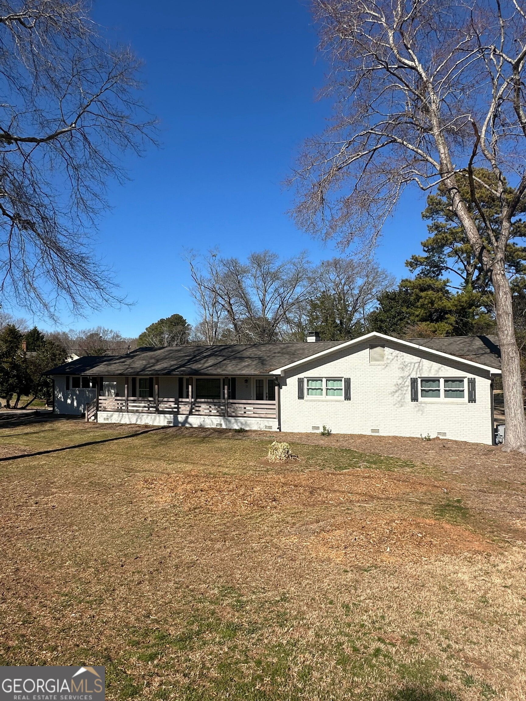 175 Thompson Place Gainesville, GA 30506 - Photo 1 of 32 a view of a house with a yard