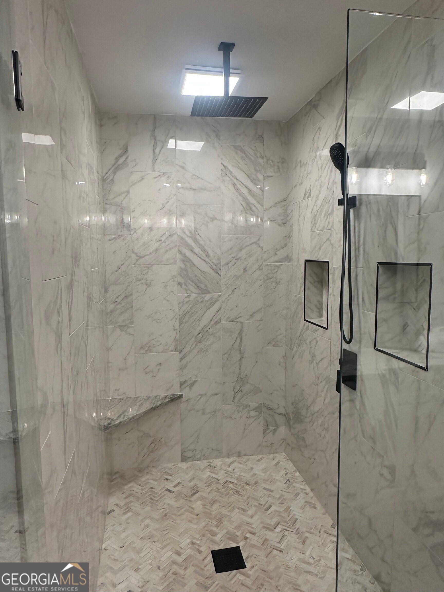 175 Thompson Place Gainesville, GA 30506 - Photo 13 of 32 a bathroom with a shower