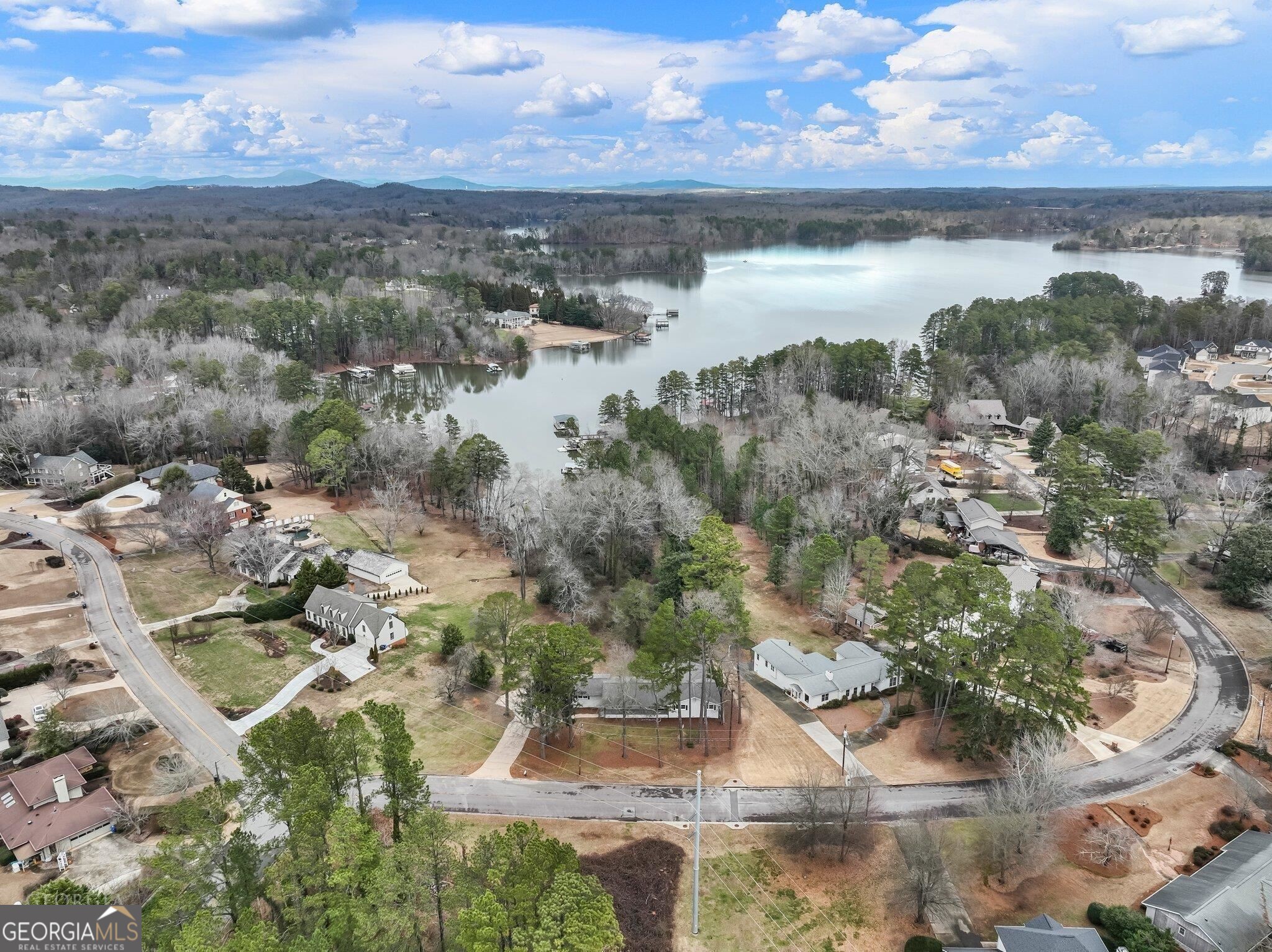 175 Thompson Place Gainesville, GA 30506 - Photo 14 of 32 a view of lake with mountain