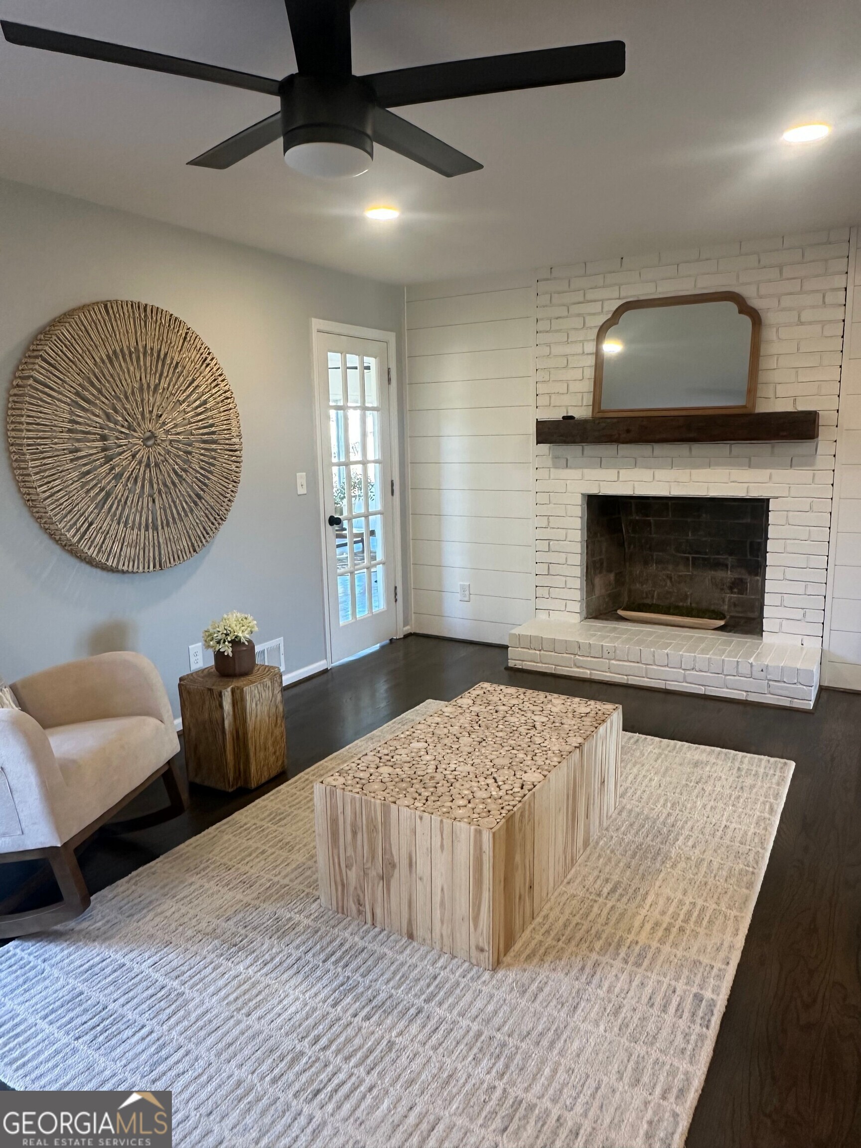 175 Thompson Place Gainesville, GA 30506 - Photo 2 of 32 a bedroom with a bed and a couch