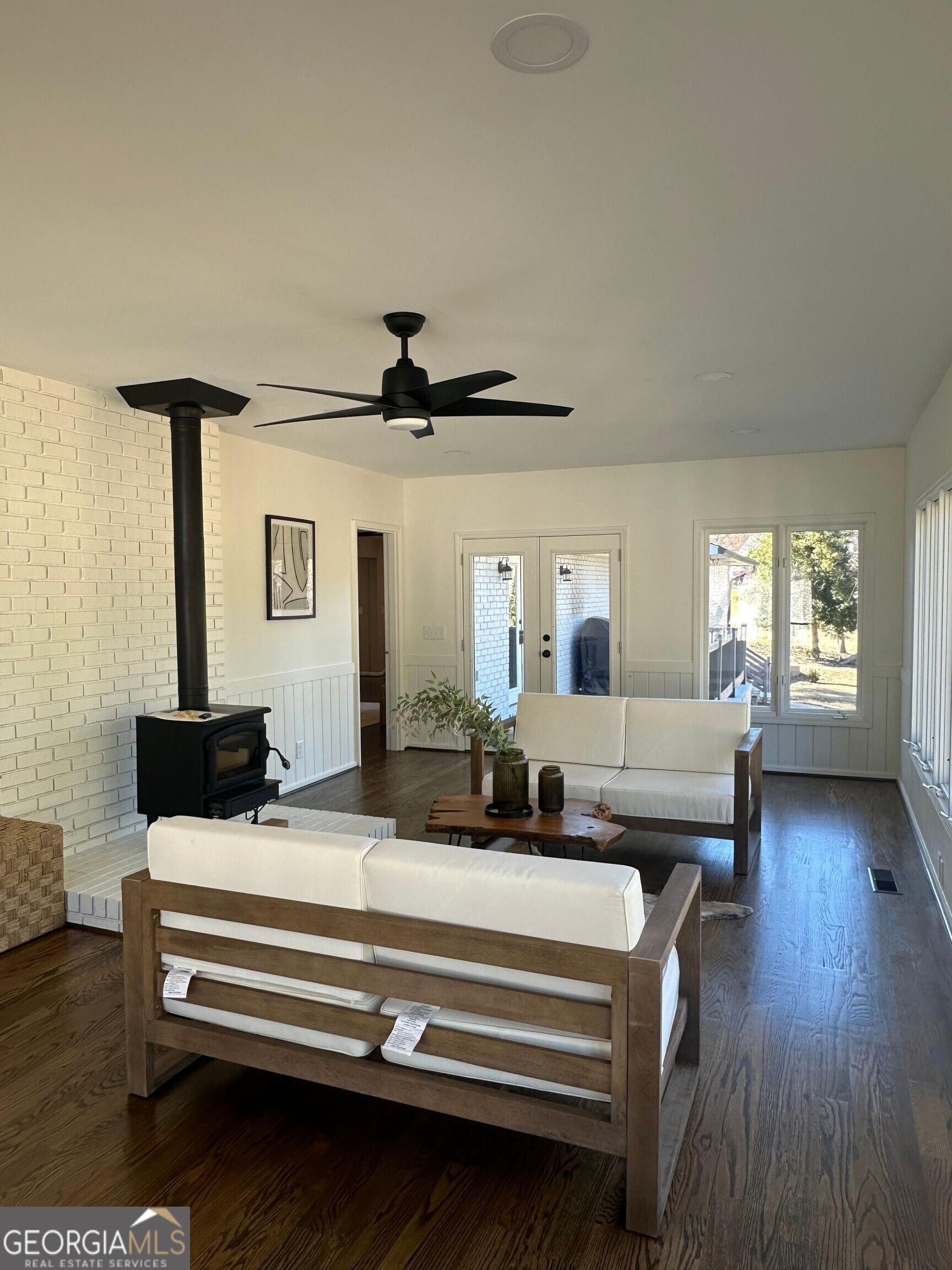 175 Thompson Place Gainesville, GA 30506 - Photo 7 of 32 a bedroom with furniture and wooden floor