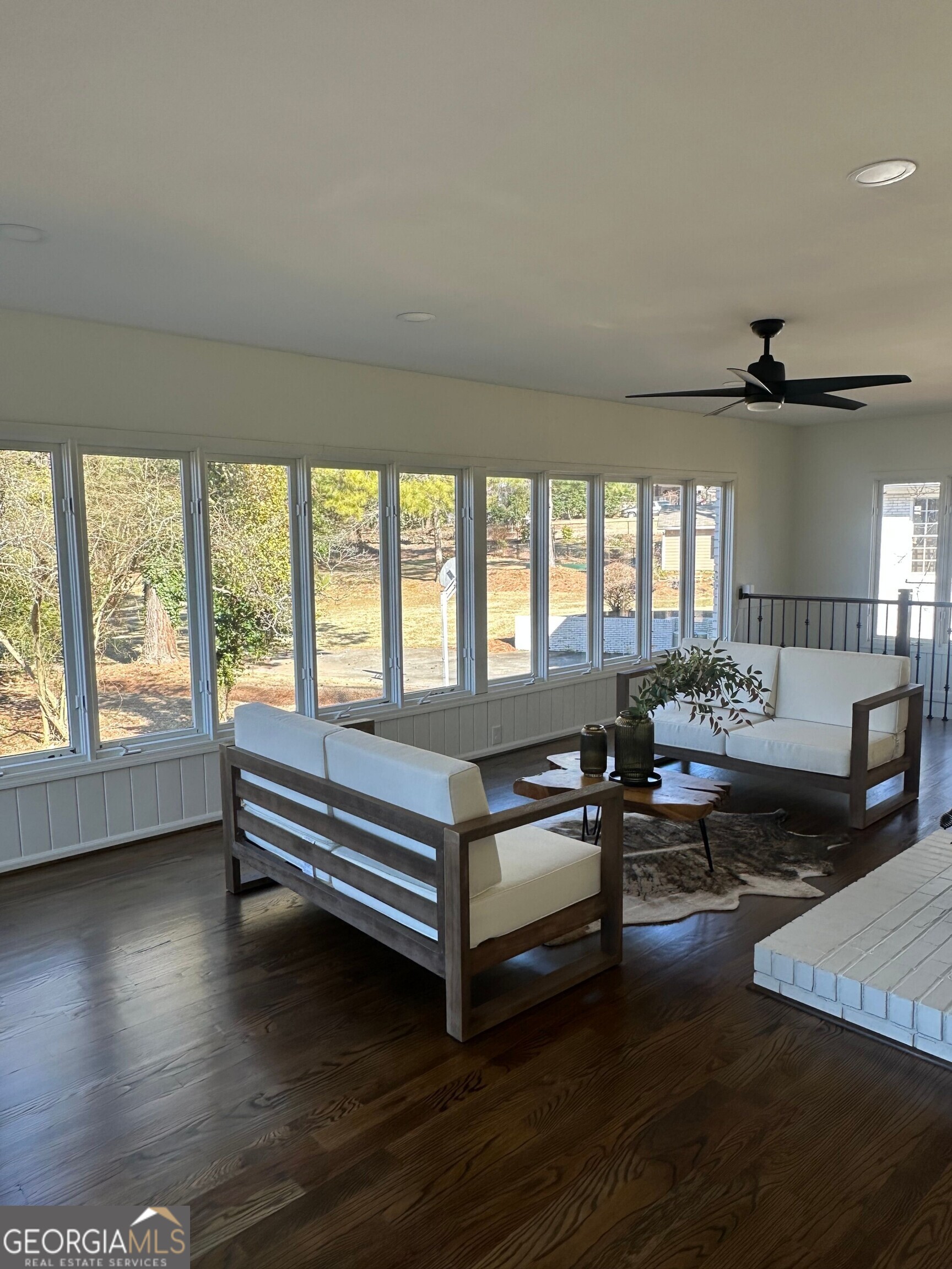 175 Thompson Place Gainesville, GA 30506 - Photo 8 of 32 a living room with furniture and a large window