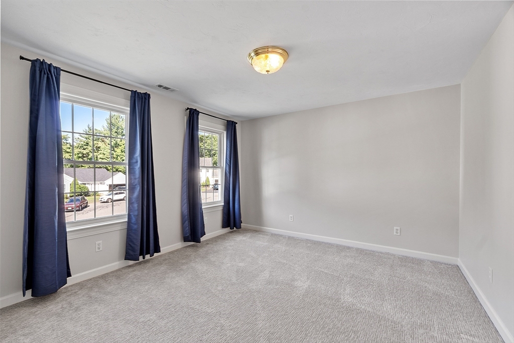 18 Sycamore Road Shrewsbury, MA 01545 - Photo 22 of 40 a view of an empty room with a window