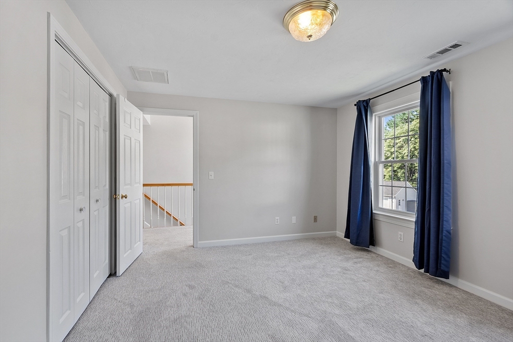 18 Sycamore Road Shrewsbury, MA 01545 - Photo 23 of 40 a view of an empty room with a window